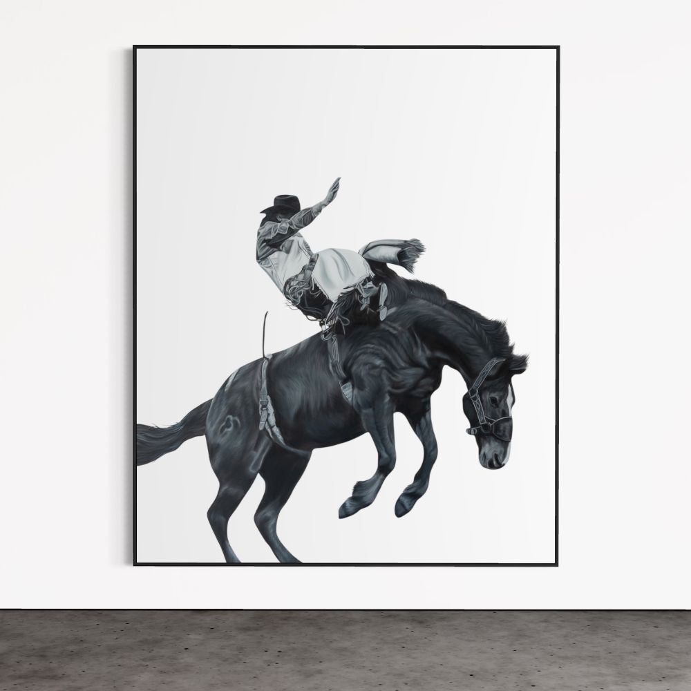 Framed artwork of a cowboy riding a bucking horse on a white background