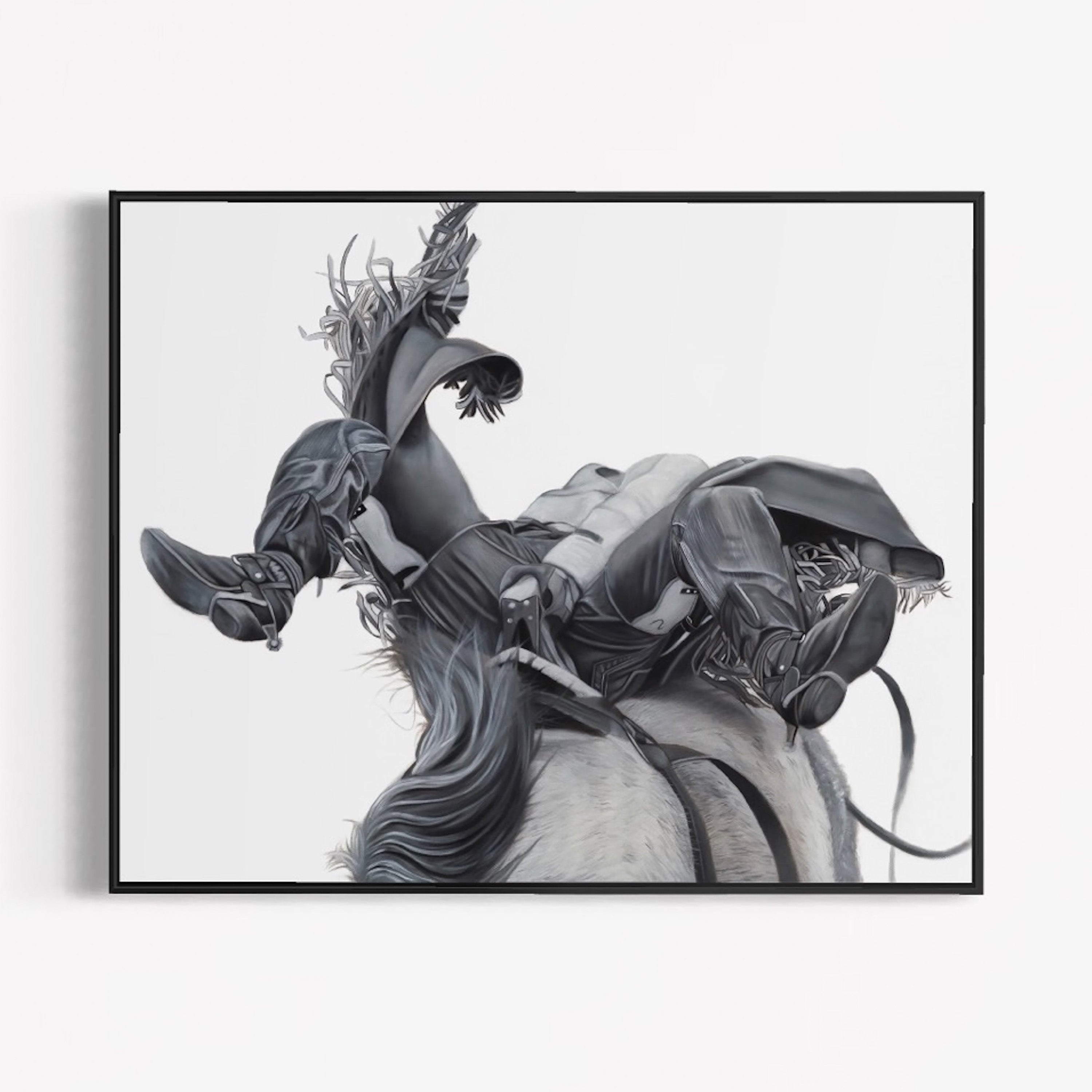 Framed artwork of a horse with a rider's boots and stirrups on a white background