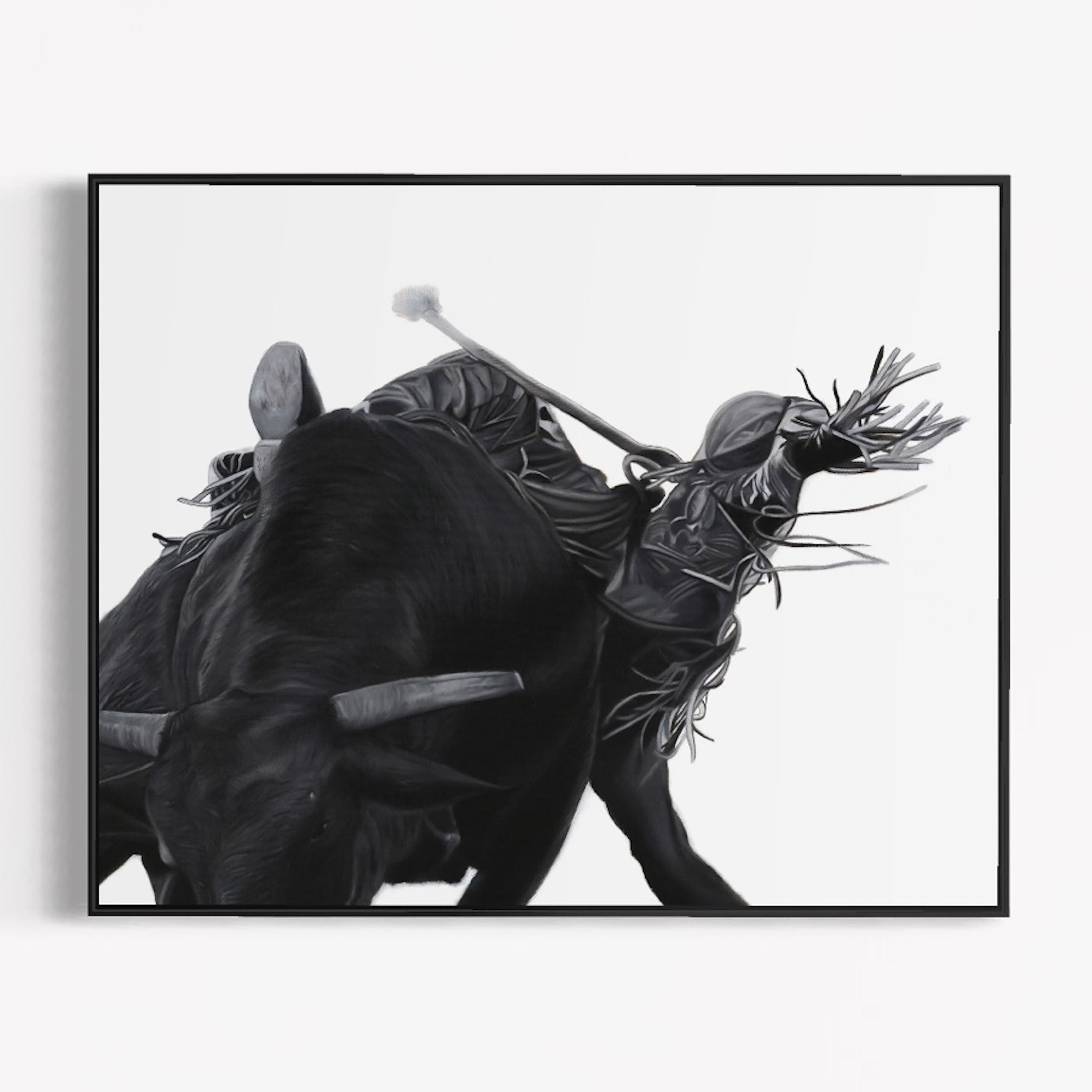 Framed black and white artwork of a bull with floral headgear on a white background