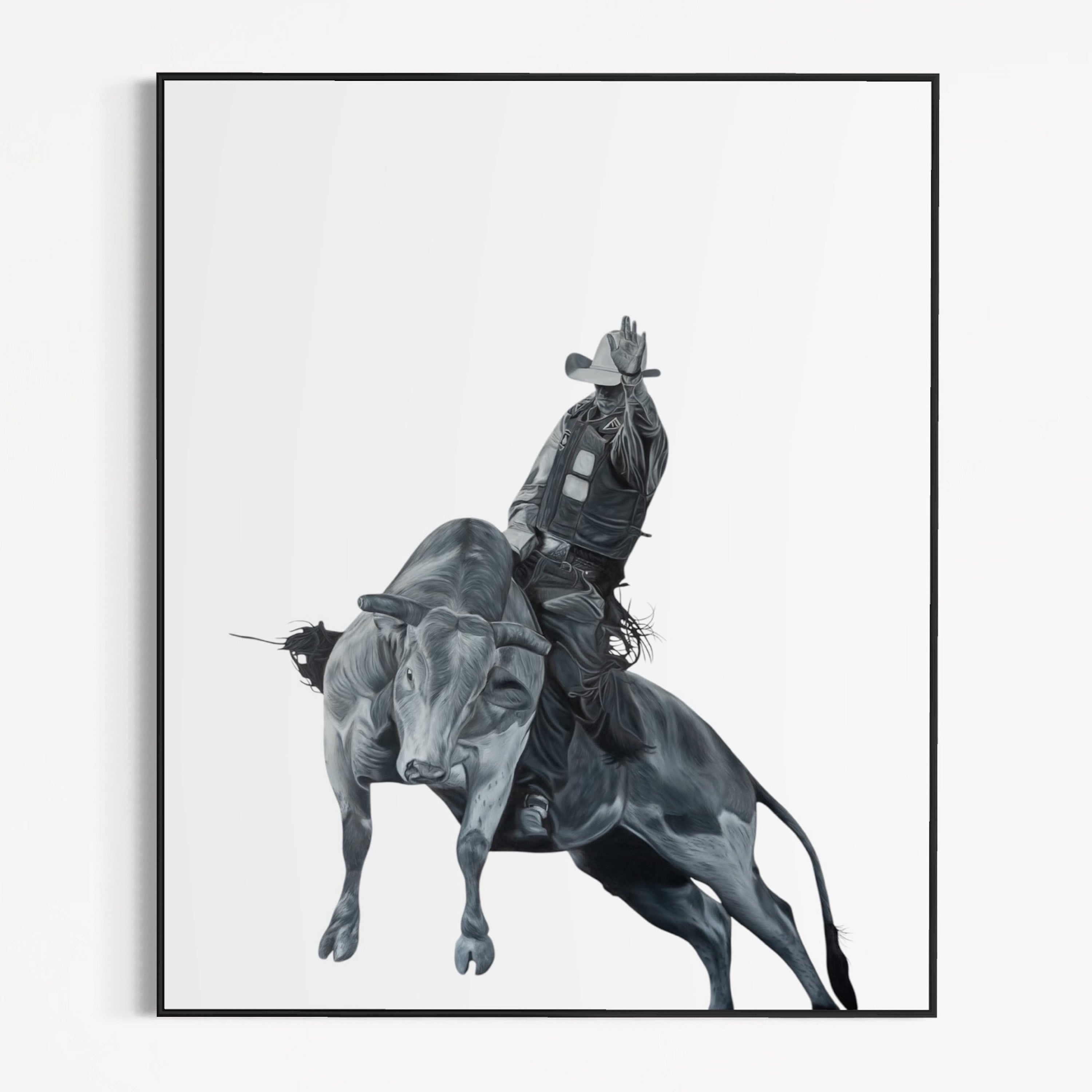 Framed artwork of a cowboy riding a bucking bronco on a white background