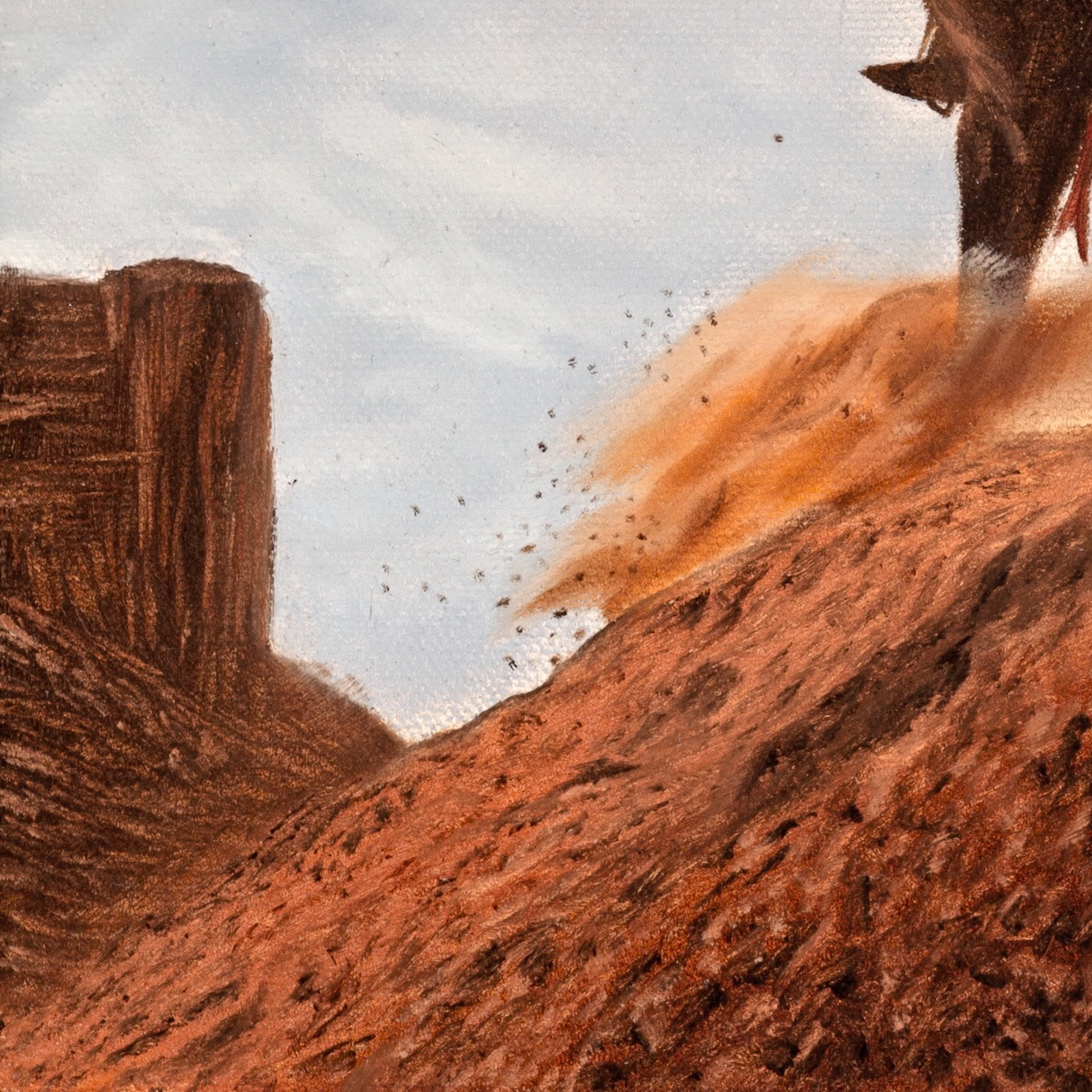 Horse running on a dirt path with a wooden fence and blue sky in the background