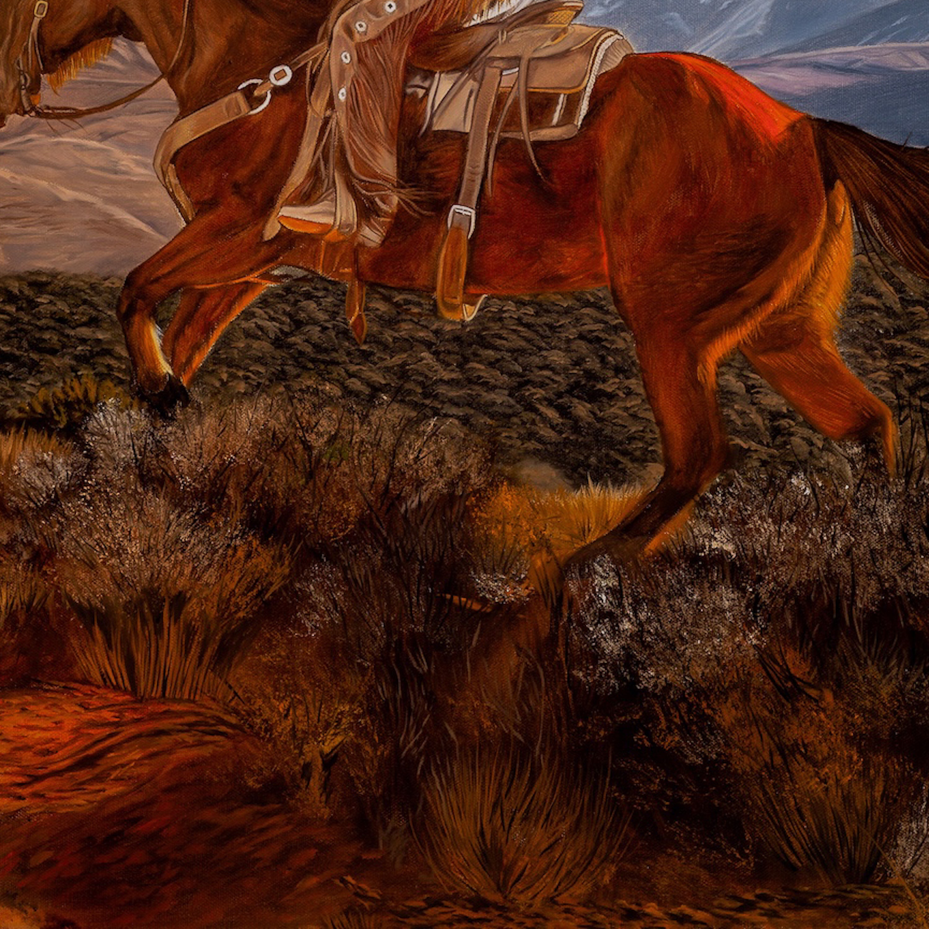Horse with a saddle in a desert landscape