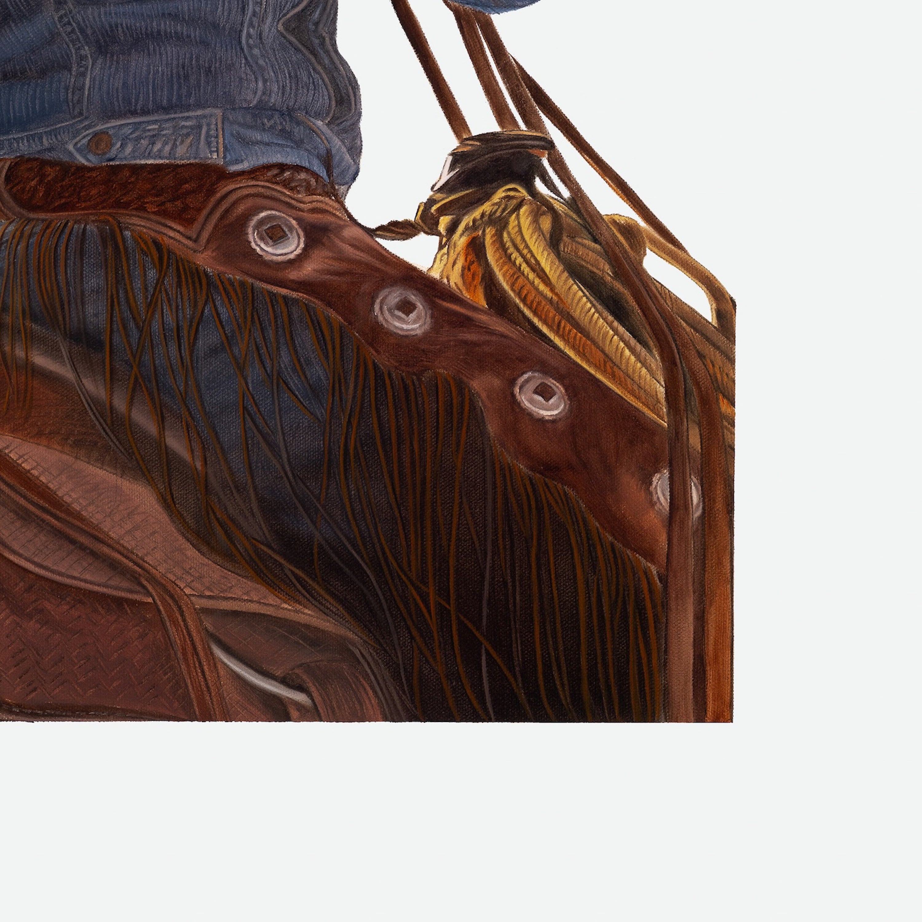 Close-up of a brown leather bag with fringes on a white background