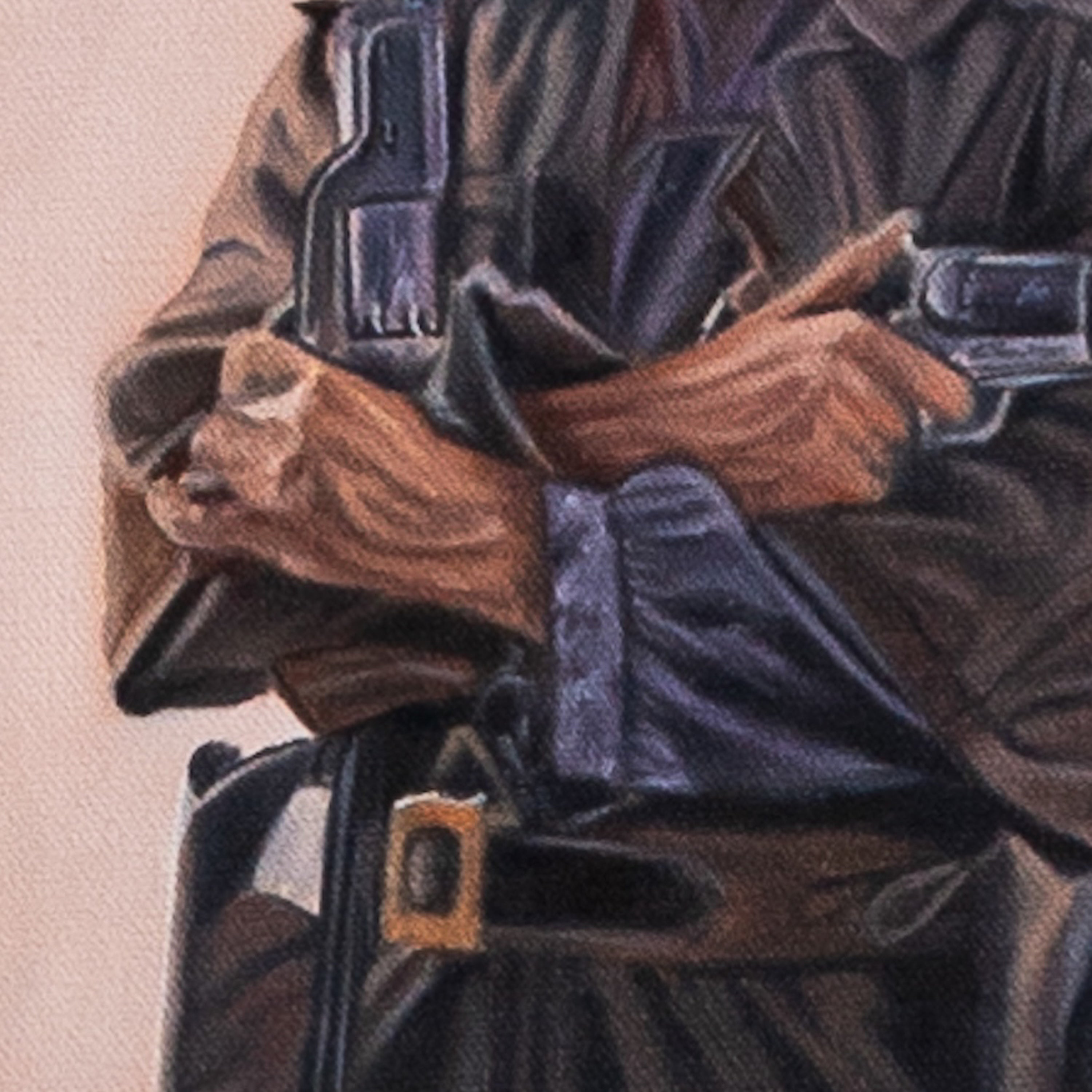 Close-up of a person wearing a dark coat with a belt and gloves on a light pink background